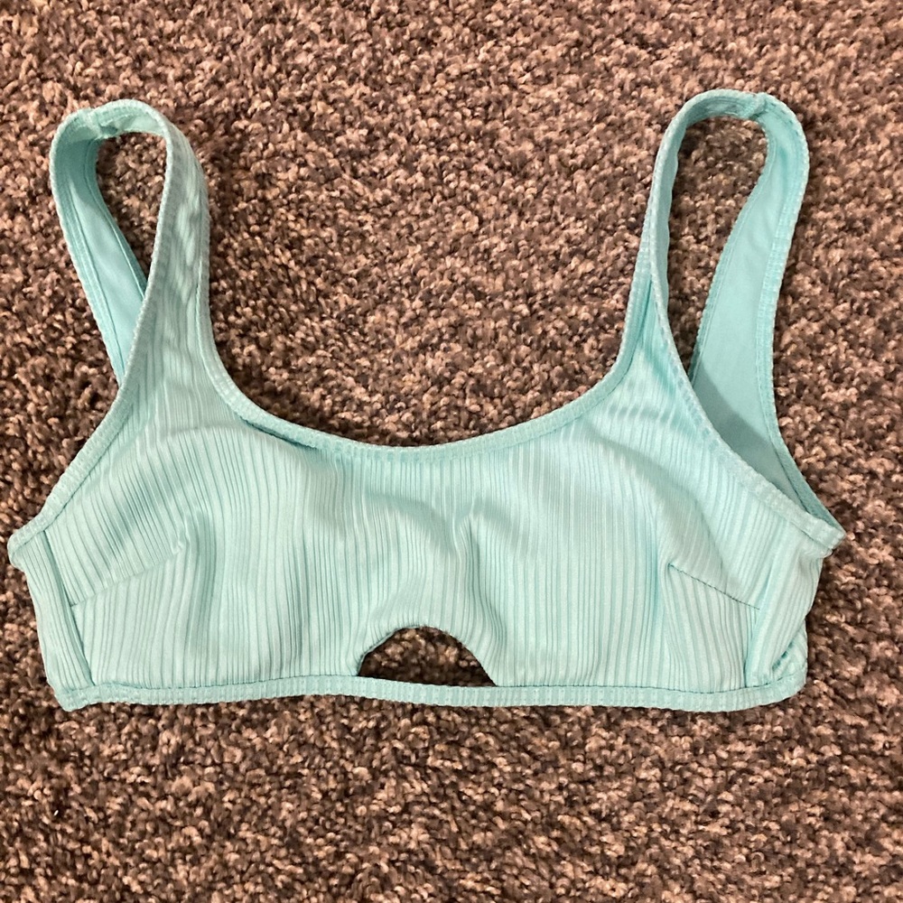 Light blue swimsuit with light pink bottoms
